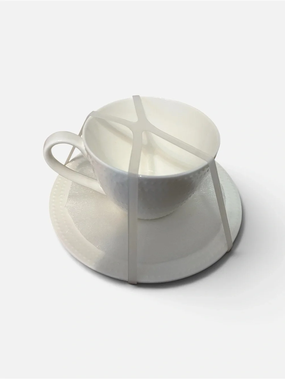 Mikasa White Textured Ceramic Teacup and Saucer Set